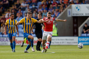 Tom Bloxham of Shrewsbury Town and Luke Murphy of Crewe Alexandra. (AMA)