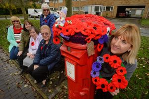 Albrighton Craft Group have been busy decorating, pictured here with a knitter bombed post box. At the front is: Jan Gold, and standing at the back of the bench is: Judy Green, then sitting L-R: Nicky Huish, Carolyn Roberts, Dorothy Marsh and Irene Taylor