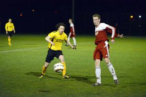 Ellesmere's Mike O' Reilly and Wem's Christian Oldham
Elesmere in yellow