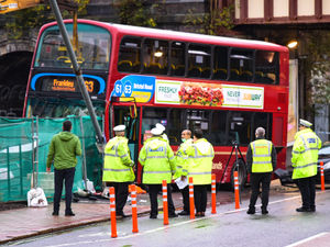 Supporting image for story: Woman seriously injured after being trapped under double-decker bus in five-vehicle crash
