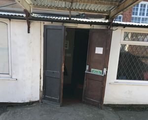 A damaged door at the association on Wolverhampton Road