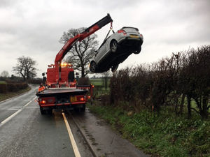 The car being recovered in Oswestry