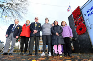 Kingswinford RBL branch chair Bob Townsend, branch secretary Fred Gorman and vice president Shelly Smith pose with members of the institute. The display can be seen on the right of the photograph.