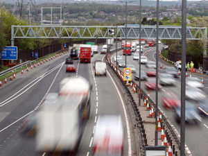 Supporting image for story: M6 lanes closed as trailer overturns