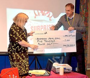 £5,000 – Broadmeadow headteacher Lisa Walker receives the cheque