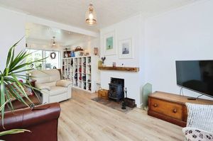 Bright open-plan lounge and dining area with garden access
