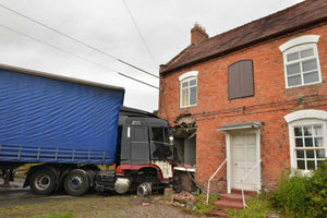 The scene of the incident on the A41 in Shakeford after a lorry crashed into a house