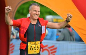 Rob Davies, from Banger on Dee, celebrates at the finish
