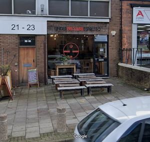 Say 'Ee do ba de' as you sip your coffee at Under Pressure Espresso