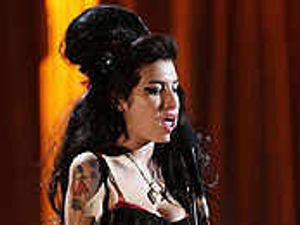 Supporting image for story: Troubled Amy to star in V Festival