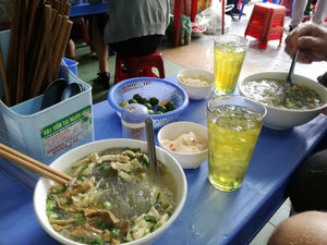 Small stools and big bowls - feasting on pho in Halong Bay's busiest cafe
