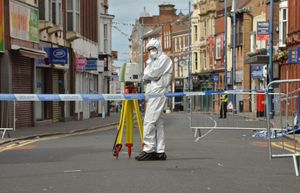 Police on Stourbridge High Street after Mr Passey's death