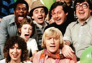 Tiswas stars (back from left) Lenny Henry, Sylvester McCoy, Peter Tomlinson, Frank Carson, (middle) Paul ‘the Kid’ Hardin, (front) Sally James and Chris Tarrant
