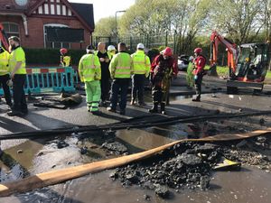 Supporting image for story: Wednesbury flood: Clean-up begins after roads, cars and homes hit by 10 MILLION litres of water