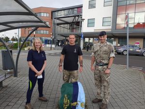 Steve with wife Michaela and Captain Stuart Welton from 22 Signal Regiment at Walsall Manor