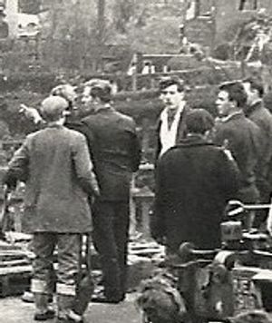 A 14-year-old Ken Ford amid the rubble of his home
