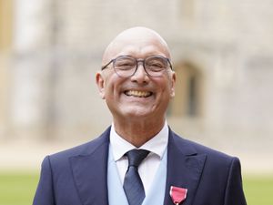 A close-up of Gregg Wallace smiling