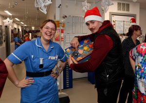 Walsall FC players visit Walsall Manor Hospital.Jamie Jellis jokes around with staff.
