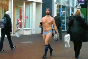 Andrew Thomas walks with his pint