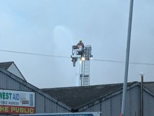 Earlier today, fire service personnel could be seen using aerial platforms to douse the flames