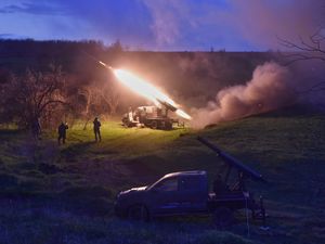 Ukrainian servicemen fire a multiple launch rocket system based on a pickup truck in the Zaporizhzhia region