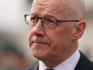 First Minister John Swinney