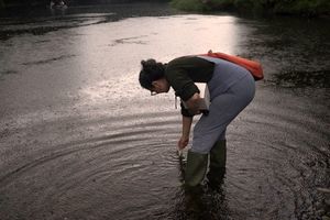 A volunteer sampling water from the river Wye. Picture: Richard Greatrex