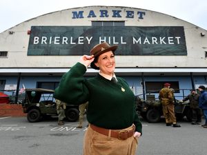 Supporting image for story: 13 nostalgic photos as Blitz spirit and plenty of authentic costumes bring 1940s spirit to Black Country market