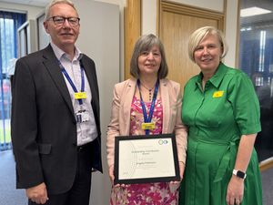 Supporting image for story: Hospital worker with 40 years service wins prestigious award