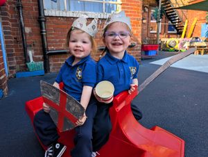 Sisters, 2-year-old Nelly and 4-year-old Scarlett Ward with their St. George’s crowns, swords, shields and decorated cups!