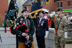 Market Drayton's Remembrance Sunday Parade. McMachan from the Royal Irish Regiment playing the Lament