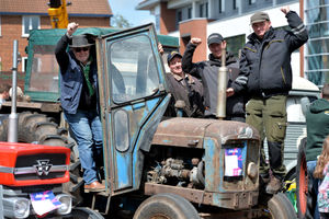 From left to right, Patrick Gandy, Kevin Norris, Will Booton and Ian Botley on Patrick's 1963 tractor