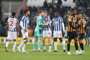 Torbjorn Heggem celebrates with his Baggies team-mates after the win at Hull. Pic: PA
