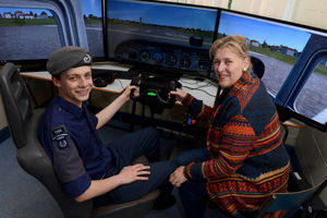 Lynnette Williams sees the flight simulator in action with cadet Daniel Ashton