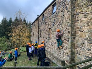 Young people trying out adventurous activities at past Camps for All events