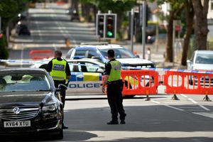Police remained at the scene following the shooting