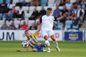 George Nurse of Shrewsbury Town and Josh Dugmore of AFC Telford United (AMA)