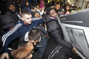 Buying online will avoid chaotic shopping scenes like this