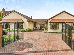 Supporting image for story: This property in Dudley used to be two separate homes - now it's a unique four-bedroom bungalow with a stunning garden