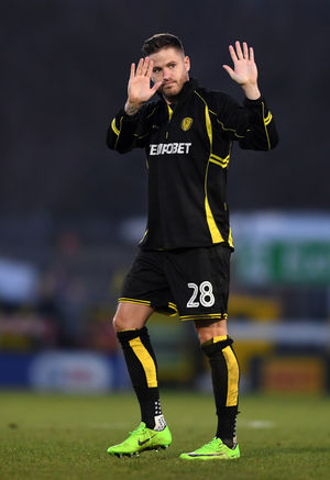 Michael Kightly of Burton Albion apologises to the fans of Wolverhampton Wanderers at full time after scoring against his former Club.