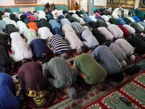 Muslims praying at a mosque