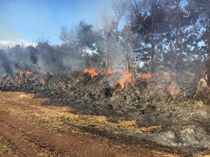 Bales being allowed to burn down. Photo: @SFRS_MDrayton