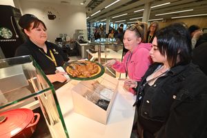 Elizabeth Hughes serves Health students Skye Taylor and Lucy Harris at the new-look canteen area