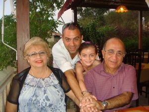 Maya with her father and grandparents in Beirut in happier times 