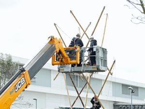 Supporting image for story: Police charge 26 people following protest outside printing works