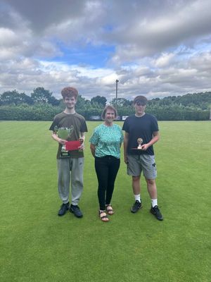 Baron Cup winner Dan Corbett and runner-up Jack Lawrence with Sheila Rogers who presented the prizes