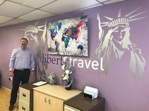 Roger Blake may relocate his business that has been in Oswestry for 31 years after planning permission was granted for a controversial HMO next door. Picture: Liberty Travel