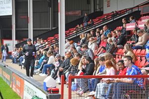 Walsall fans watch training from the stands.
