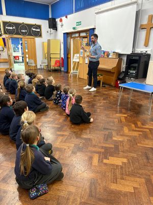 Ben sharing his experiences in an all-school assembly