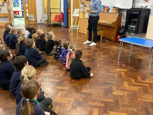 Ben sharing his experiences in an all-school assembly 